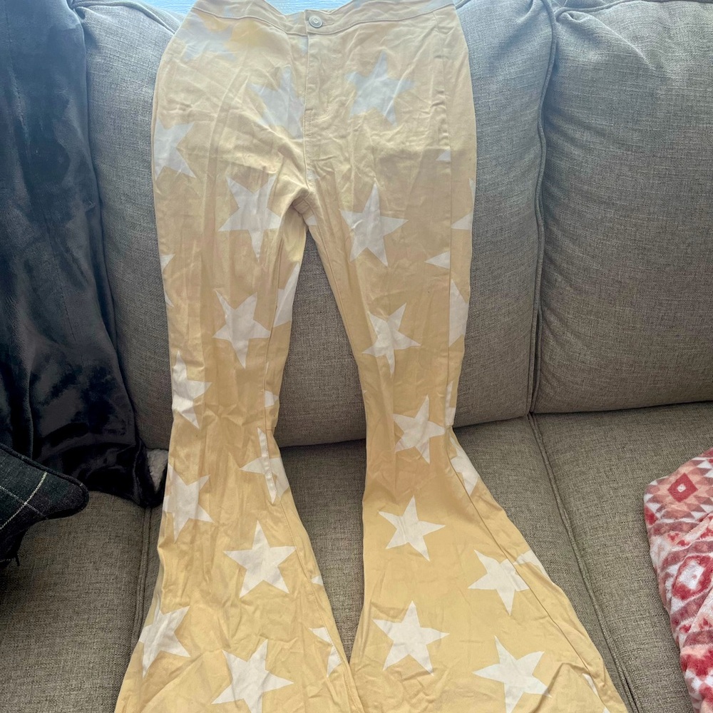 Altar’d State yellow star flare jeans